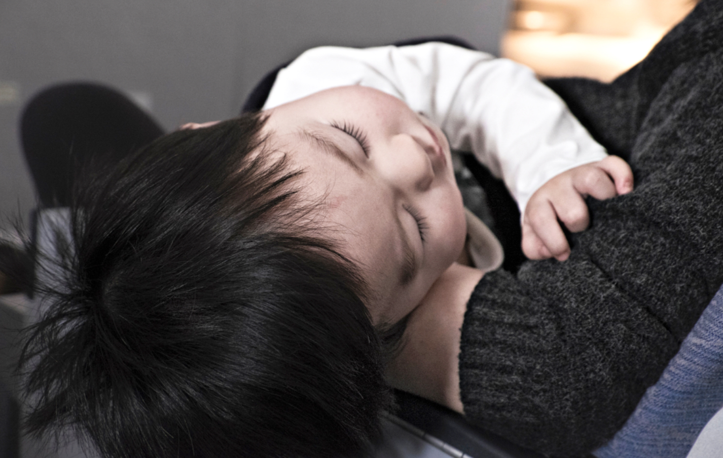 Baby in parent's arms